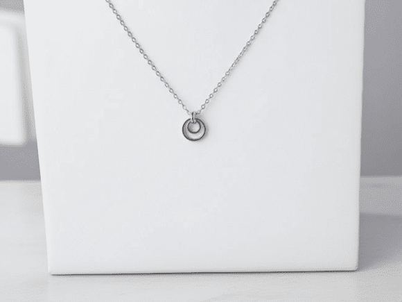 Alyce n Maille eclipse stainless steel pendant